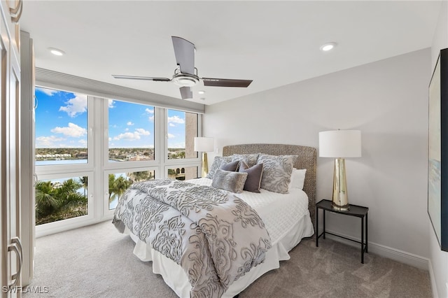 carpeted bedroom with recessed lighting, ceiling fan, and baseboards