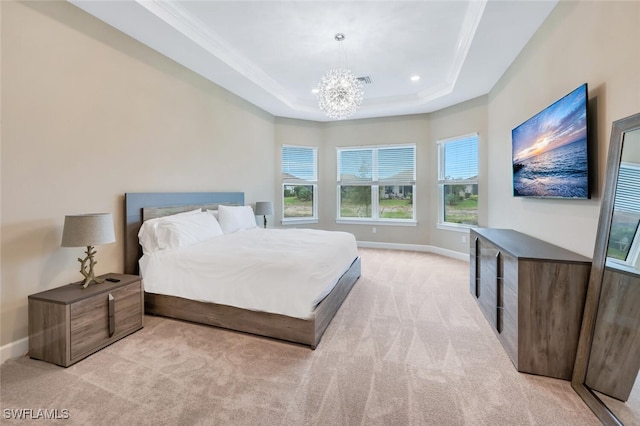 bedroom featuring light carpet, baseboards, a raised ceiling, crown molding, and a notable chandelier