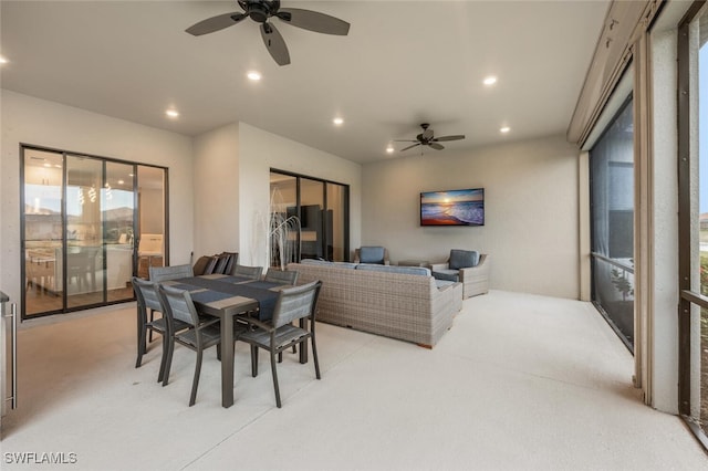 dining area with a ceiling fan and recessed lighting