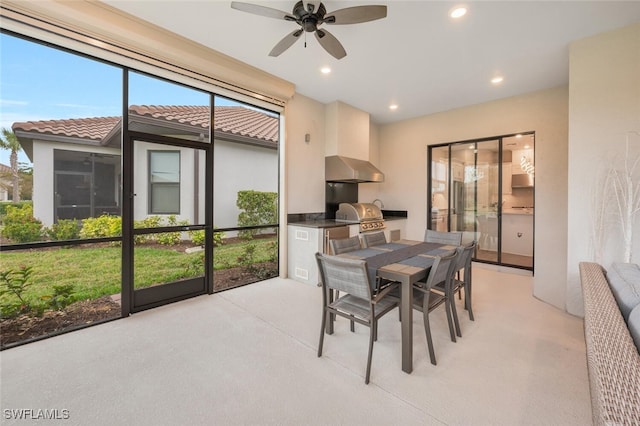 dining space with a ceiling fan and recessed lighting