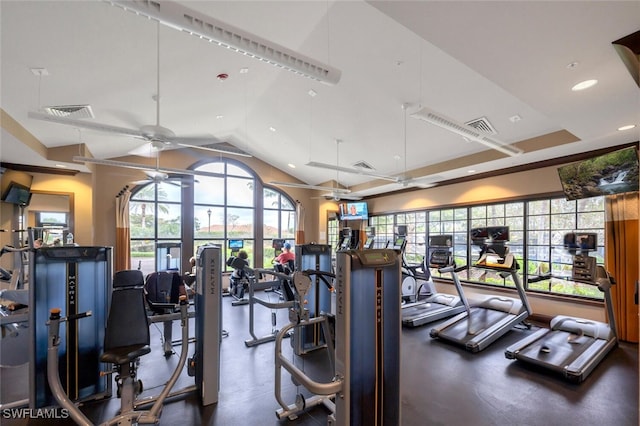 exercise room with lofted ceiling, visible vents, ceiling fan, and recessed lighting