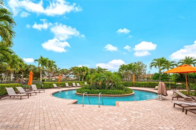 pool featuring a patio area