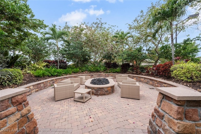 view of patio / terrace with a fire pit