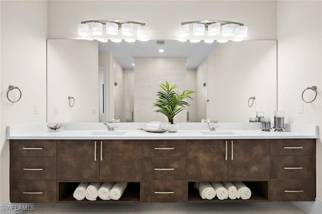 full bathroom with visible vents and vanity