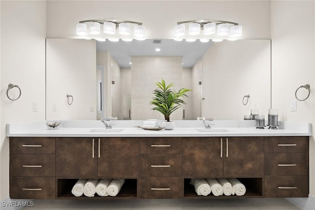bathroom featuring visible vents and vanity