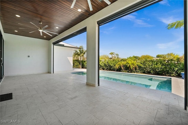 pool featuring a patio and a ceiling fan