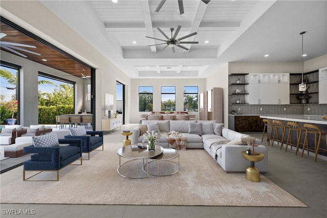 living room with beam ceiling, recessed lighting, and ceiling fan