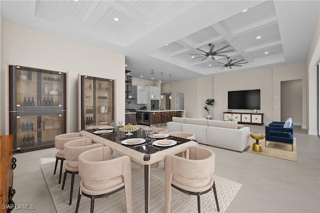 dining area featuring beamed ceiling, recessed lighting, coffered ceiling, and a ceiling fan