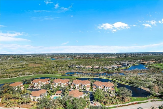 birds eye view of property with a water view and a residential view