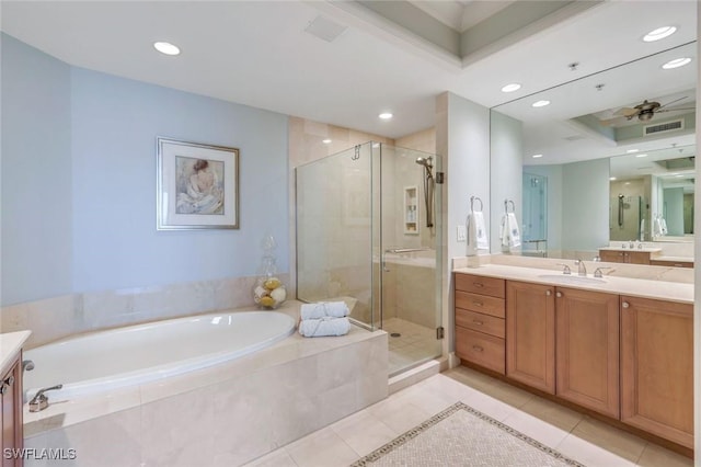 full bathroom featuring a bath, vanity, a shower stall, and tile patterned floors