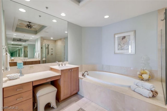 bathroom with a garden tub, a shower stall, vanity, and recessed lighting