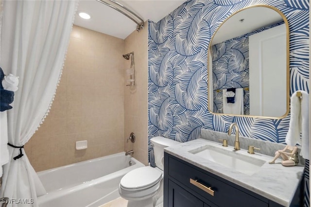 bathroom featuring toilet, wallpapered walls, shower / tub combo with curtain, and vanity