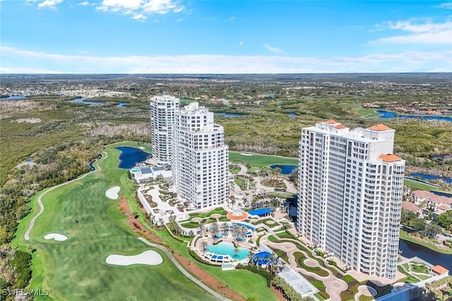 aerial view featuring a view of city, view of golf course, and a water view