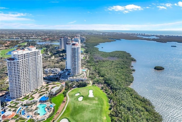 birds eye view of property featuring a water view and a city view