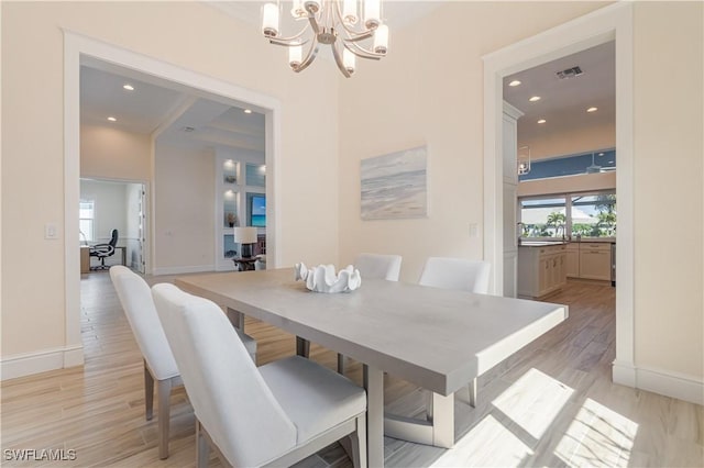 dining space featuring light wood-style flooring, visible vents, baseboards, and recessed lighting