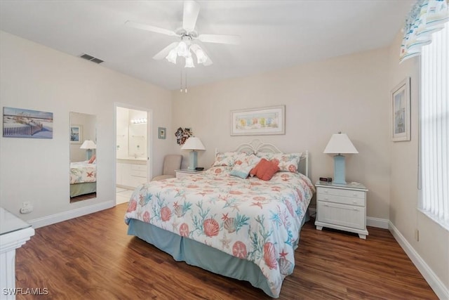 bedroom featuring baseboards, visible vents, connected bathroom, ceiling fan, and wood finished floors