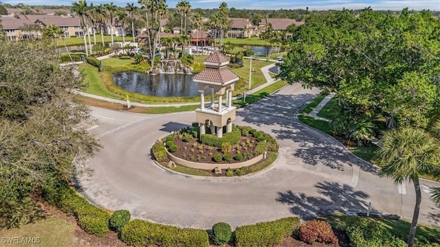 aerial view with a water view and a residential view