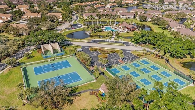 aerial view with a water view and a residential view