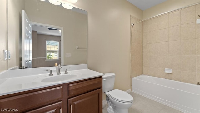 bathroom with shower / bathing tub combination, vanity, toilet, and tile patterned floors