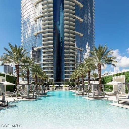 community pool with a patio