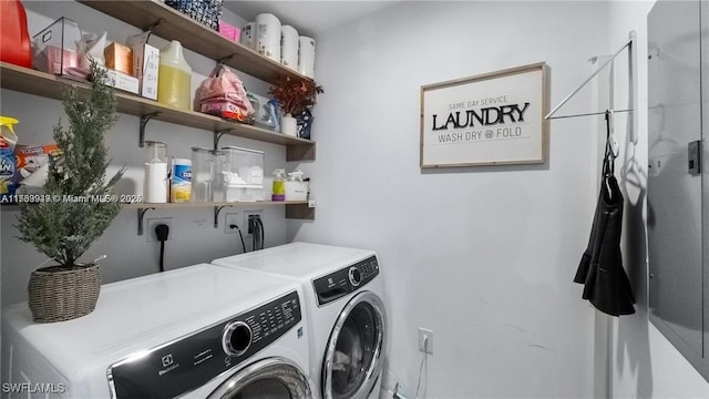 laundry room with laundry area and separate washer and dryer