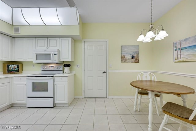 kitchen with light countertops, visible vents, white cabinets, a chandelier, and white appliances