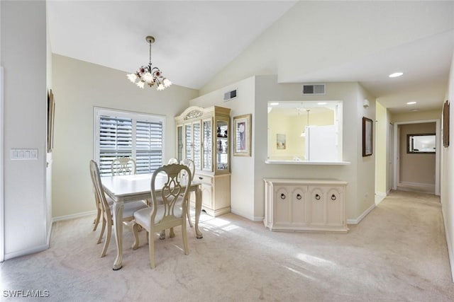 dining space featuring light carpet, baseboards, visible vents, and an inviting chandelier