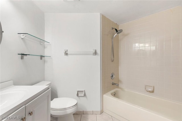 bathroom featuring vanity, toilet, washtub / shower combination, and tile patterned flooring