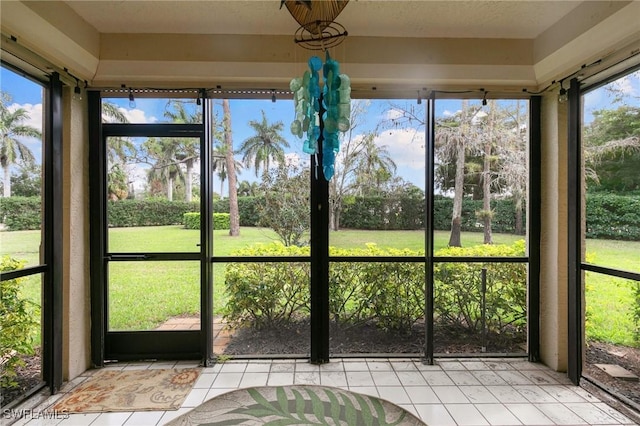 unfurnished sunroom featuring a healthy amount of sunlight