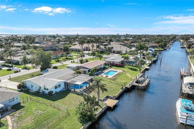 bird's eye view featuring a residential view and a water view