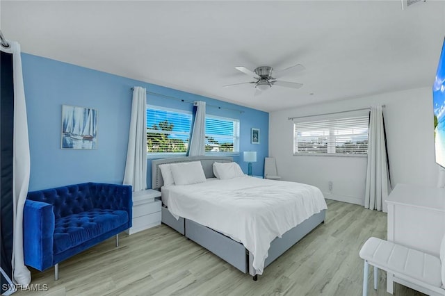 bedroom featuring a ceiling fan and light wood-style floors