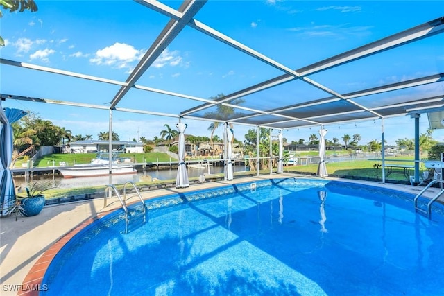 pool featuring a lanai, a patio area, a dock, and a water view