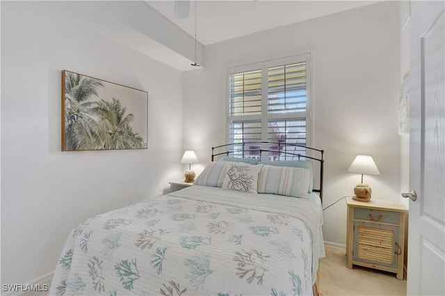 bedroom with baseboards and carpet flooring