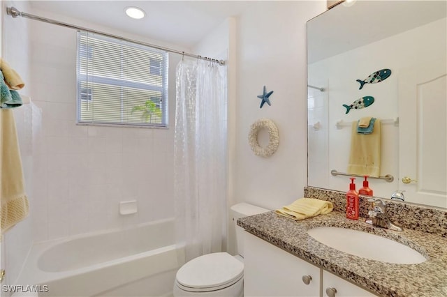 bathroom with toilet, shower / bathtub combination with curtain, and vanity