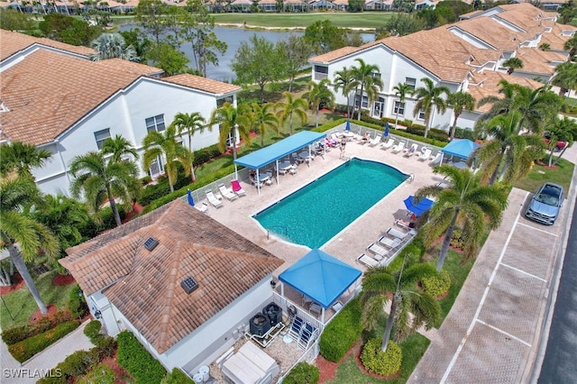 aerial view with a residential view and a water view