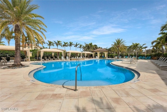 community pool featuring a patio area and a gazebo