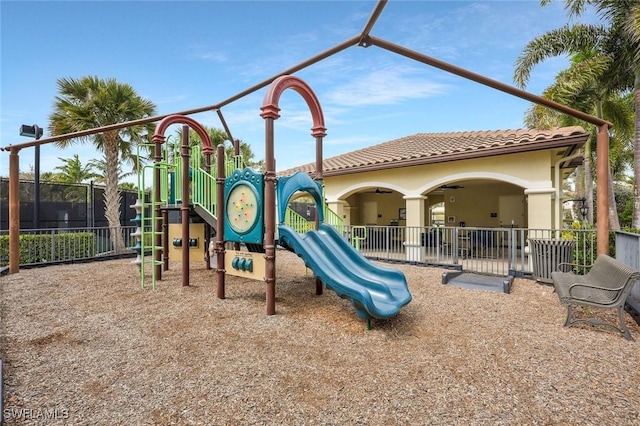 community play area featuring fence