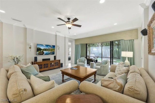 living room featuring ceiling fan, visible vents, and recessed lighting