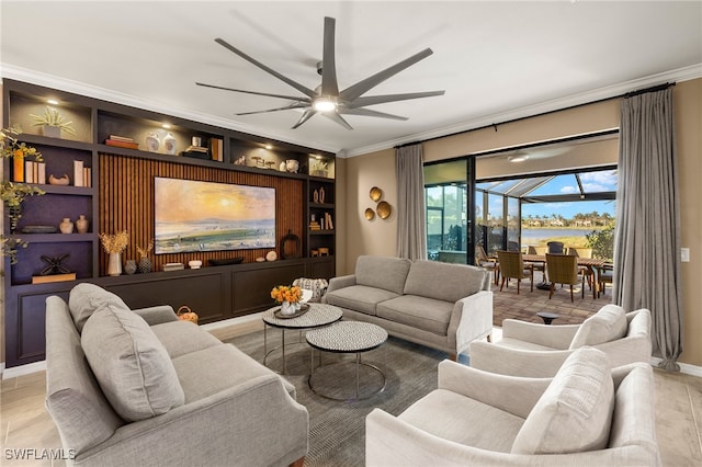 living area with ceiling fan, built in shelves, and crown molding