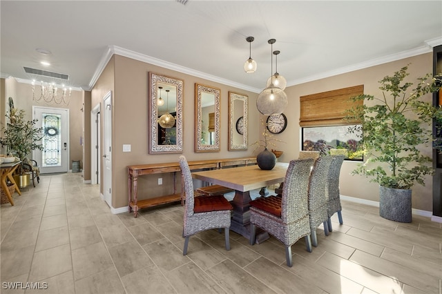 dining room with ornamental molding, visible vents, baseboards, and an inviting chandelier