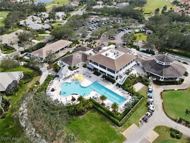 birds eye view of property with a residential view