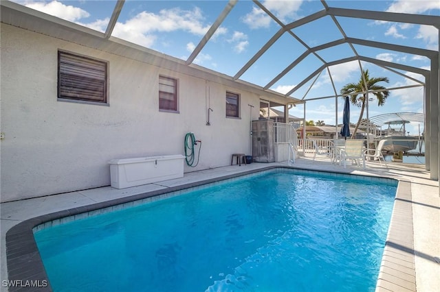 pool featuring a patio area and a lanai