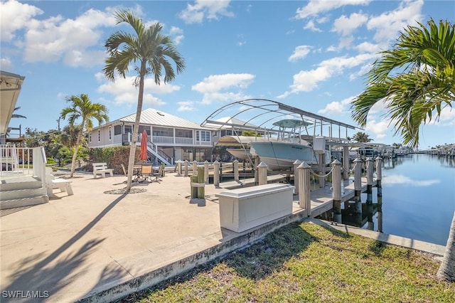 view of dock with a water view and boat lift