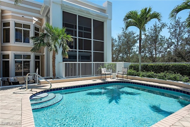 community pool featuring a patio