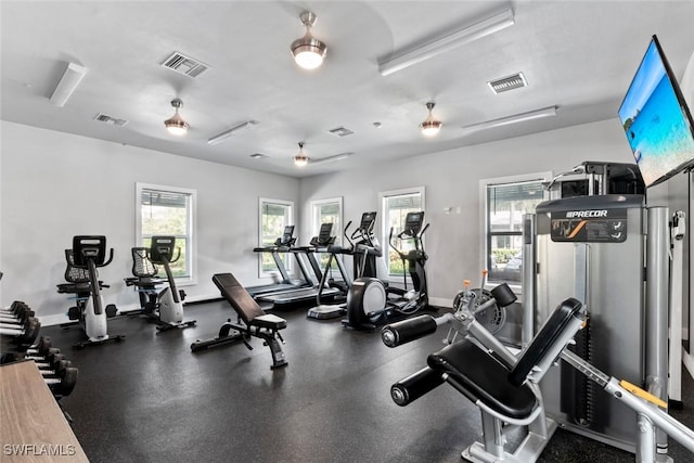 workout area featuring visible vents and baseboards