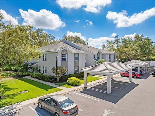 view of partially covered parking lot