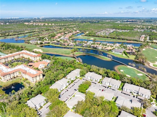 birds eye view of property with a residential view, a water view, and golf course view