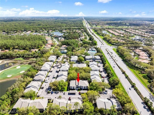 aerial view featuring a residential view and golf course view