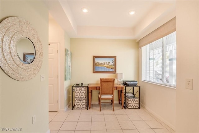 office with tile patterned flooring, baseboards, a tray ceiling, and recessed lighting