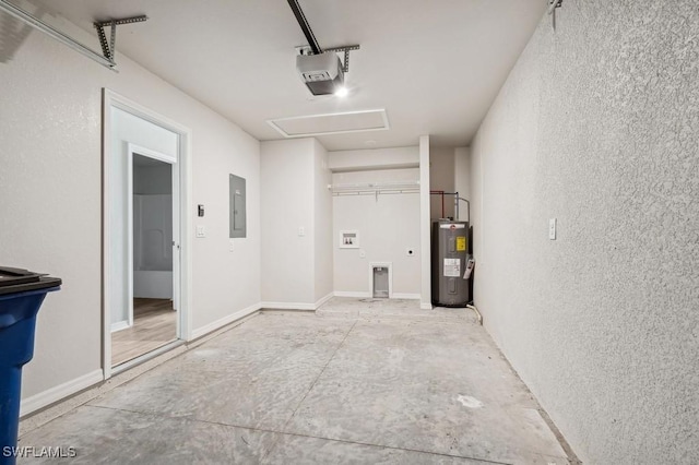 garage with electric panel, baseboards, a textured wall, a garage door opener, and electric water heater